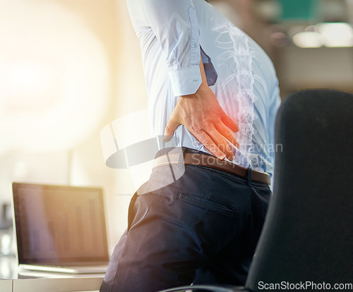 Image of Businessman, back pain and x ray of spine from sitting and working by laptop on desk chair at the office. Employee male suffering spinal injury or slip disk with ache, inflammation or painful join