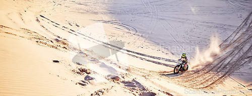 Image of Sand, mockup and motorcycle with a sports man riding offroad on dunes outdoor in nature for recreation. Desert, bike and mock up with a male athlete taking a ride for fun, freedom or adventure