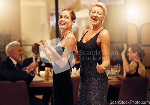 Image of Dance, singing and portrait of women at an event for new years, birthday celebration or party. Smile, happy and mature, elegant and classy friends at a social gala for dancing and to sing at a venue