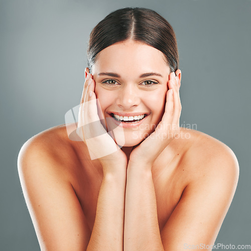 Image of Skincare, beauty and smile portrait of woman on gray background for cosmetics, facial treatment and spa. Wellness, dermatology and face of girl with glowing, healthy skin and self care in studio