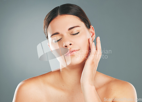 Image of Face, woman with eyes closed, skin and peace with beauty, facial treatment and content isolated on studio background. Natural cosmetics, dermatology glow with shine and skincare with wellness mockup