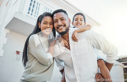 Image of Mother, father and child with smile for new home, property or real estate family time outside the house. Portrait of happy mom, dad and son on piggyback smiling in happiness for apartment building