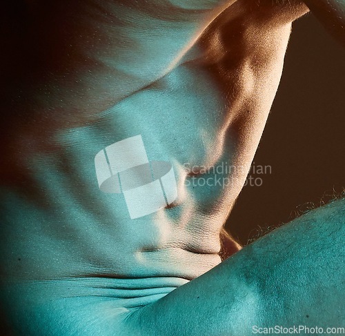 Image of Muscle, body and sexy man nude, naked and topless guy or model isolated against a dark studio background. Muscular, masculine and closeup of artistic male torso or athletic and fit person