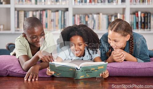 Image of Children in library, book and reading with learning and education, happy with friends and academic growth. Knowledge, information and development with young students, learn with school group