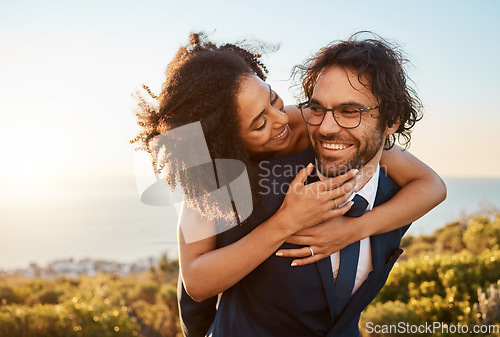 Image of Bride, groom and piggyback hug at wedding in nature, happy and smile while celebrating love, beginning and relationship. Marriage, interracial couple and black woman and man embrace outdoor with fun