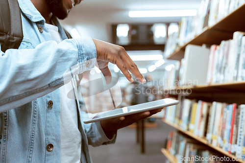 Image of Touch screen, education or black man hand on tablet in library for research, advertising or project management. Digital or university student with tech for learning, scholarship study or web search