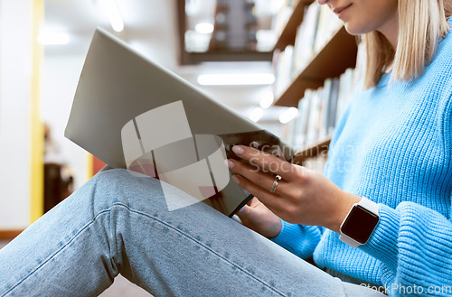 Image of Hands, woman and reading books on library floor, ground and campus learning. Closeup student, textbook and studying of knowledge, research and information at college of education, university or shelf