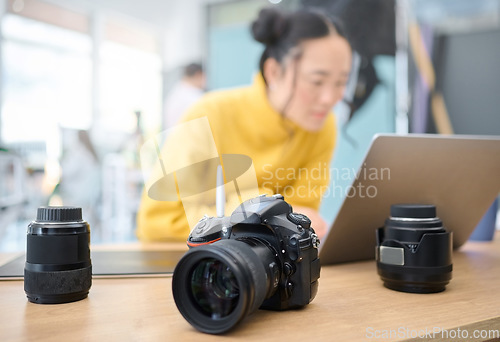 Image of Photography camera, laptop and woman editing photoshoot, focus on digital art or retouching artistic photo. Graphic tablet, creative vision and professional photographer working on creativity process