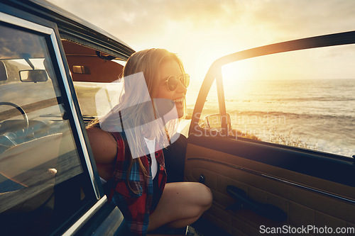 Image of Woman, sunset and beach road trip by car door with smile, freedom and happiness for summer vacation. Happy gen z girl, suv and sunglasses for sunshine, outdoor adventure or holiday by waves on travel