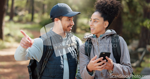 Image of Couple, hiking and selfie, outdoor and travel, black woman and man together out in nature with technology and backpacking in woods. Hiker on adventure, relationship and photo with smartphone.