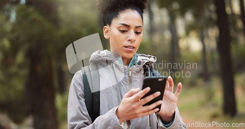 Image of Phone, hiking woman in nature for a gps location, travel and freedom in mountains of Peru during a holiday. Young, thinking and black female with a mobile for communication while trekking in a forest