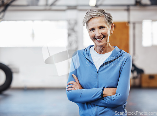 Image of Senior woman, gym and portrait of a person happy about fitness, training and exercise with mockup. Sports, happy and pilates studio of mature female with arms crossed proud about wellness and health