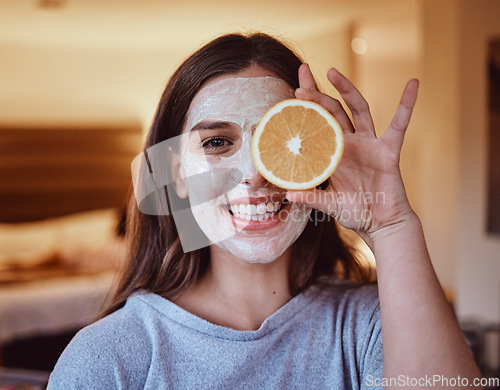 Image of Skincare, orange and portrait of woman in her home for wellness, grooming and mask, treatment and facial. Fruit, face and girl relax with citrus product, natural and skin detox routine in her home