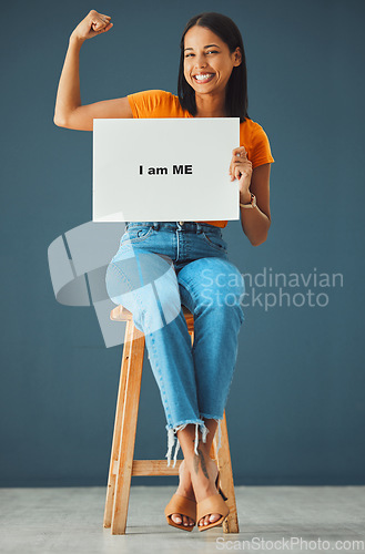 Image of Portrait, poster and black woman with strong arm pose in studio for body positivity, acceptance or self love on grey background. Billboard, banner and girl advertising confidence, empowered and proud