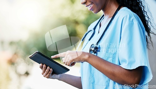 Image of Black woman, doctor and tablet with smile for communication, research or 5G connection in the outdoors. Hands of African American female medical expert or nurse browsing on touchscreen for schedule