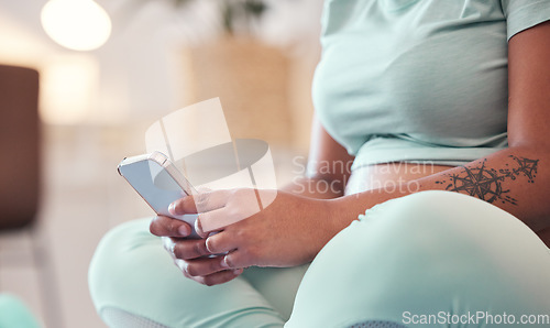 Image of Phone, yoga and woman typing message after workout for mind, body or spiritual wellness. Pilates, meditation and female networking on social media, internet or mobile app on cellphone after exercise.