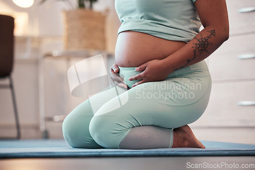 Image of Pregnant, yoga and black woman on mat, stomach and training for healthcare, prenatal and wellness. Pregnancy, African American female and lady with tummy, floor and meditation with pilates training