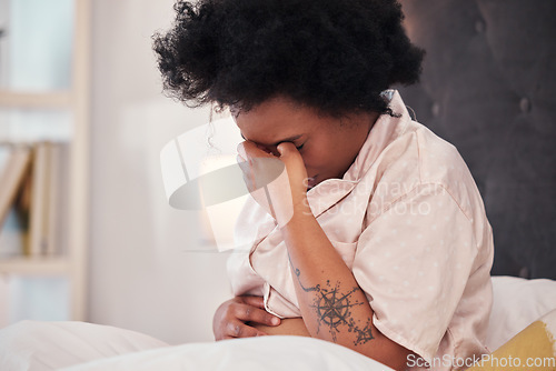 Image of Pregnant, bedroom and black woman with depression, stress and maternity issues in home. African American female, pregnancy and anxious lady in bed with headache, anxiety and mental health problems