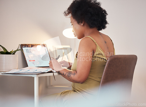 Image of Black woman, laptop and pregnant writing in remote work at home for planning, schedule or website. African American female freelancer working with computer by desk on maternity leave at the house