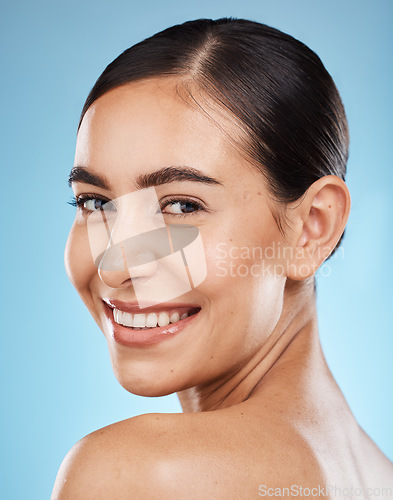 Image of Face, back skincare and beauty of woman in studio isolated on a blue background. Portrait, makeup and cosmetics of female model with healthy, glowing and flawless skin after spa facial treatment.