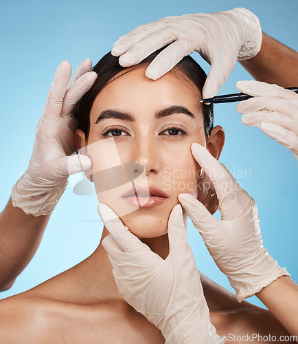 Image of Beauty portrait, woman and plastic surgery hands, isolated on studio background for medical facial and aesthetic. Doctors, medical people for reconstruction or lines with pen on model or person face