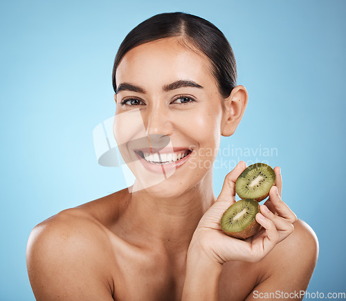 Image of Kiwi, beauty and portrait of woman isolated on studio background for natural skincare, cosmetics or facial glow. Vegan fruits, product mockup and happy model, person face for dermatology or vitamin c