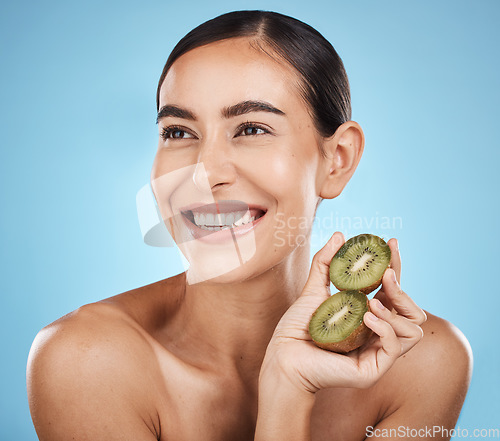 Image of Kiwi, beauty and woman isolated on studio background for natural skincare, cosmetics and facial product on mockup. Healthy, organic and happy model or person fruits for face or dermatology vitamin c