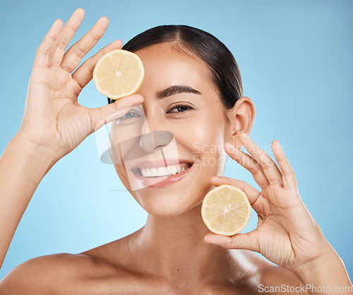 Image of Beauty, skin care and lemon woman portrait with beauty face dermatology, natural cosmetic and wellness. Aesthetic model person for vitamin c facial glow, nutrition diet and detox on blue background