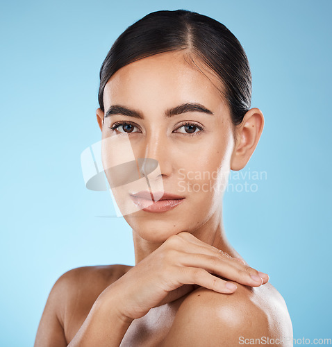 Image of Portrait, face and beauty skincare of woman in studio isolated on a blue background. Aesthetics, makeup and cosmetics of female model with healthy, glowing or flawless skin after spa facial treatment