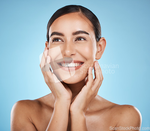 Image of Thinking, face and beauty skincare of woman in studio isolated on a blue background. Aesthetics, makeup or cosmetics of female model with healthy, glowing and flawless skin after spa facial treatment