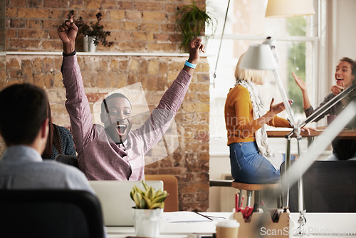 Image of Wow, success and black man in happy celebration at work after sales, goals or reaching target in an office. Job promotion, winner or excited employee with arms in the air to celebrate winning a deal