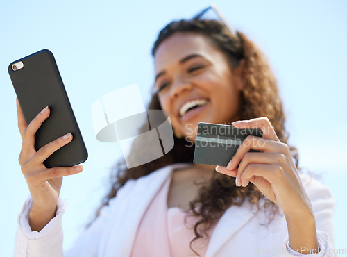 Image of Woman, hands and phone with credit card for ecommerce, online shopping or bank for purchase outside. Happy female with smile for 5G connection, banking app or buying on mobile smartphone with debit