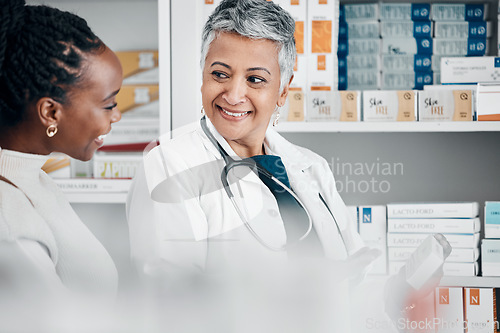Image of Pharmacy, service and black woman with pharmacist for advice, help and treatment or medicine choice. Customer, senior doctor and discussion for pharmaceutical information, questions and guidance