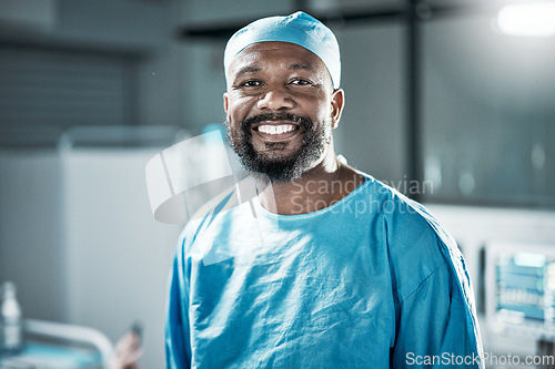 Image of Face portrait, black man and doctor in hospital satisfied with career, job and clinic profession. Healthcare, medical professional and confident, proud and happy male surgeon from Nigeria in scrubs.