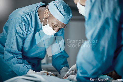 Image of Surgery, hospital and healthcare doctors in operating room for emergency operation on patient. Health, collaboration and team of medical surgeons working with surgical tools to save a life in clinic.