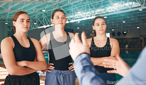 Image of Team, exercise and women listen to coach, training and workout plan for victory, fitness and wellness. Female athlete, friends and group focus, talking to trainer and discussion for practice routine