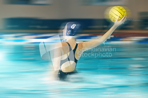 Image of Water polo, shooting and athlete in swimming pool training, exercise and fitness game in speed or motion sports. Fast woman, person hand holding ball and competition with challenge, energy or action