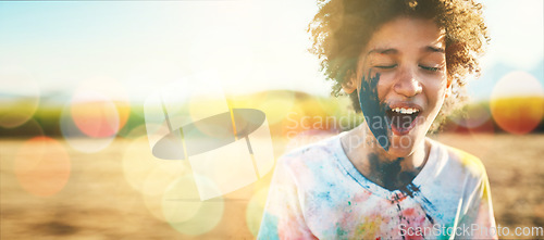 Image of Boy, outdoor and paint splash on face with mockup space by field, grass or nature for holiday in blurred background. Young happy kid, sunshine and excited smile at park, game or countryside vacation