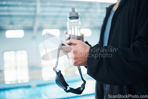 Image of Man hands, phone texting and swimming pool with goggles, water bottle or communication on social media. Aquatic sports coach, smartphone and typing on screen with mobile app, website or internet chat