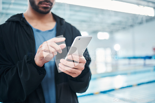 Image of Man hands, smartphone texting and swimming pool with communication, email and social media contact. Aquatic sports coach, phone and typing on screen with mobile web app, website and writing for chat