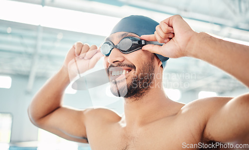 Image of Swimming athlete, happy man and start race, fitness and exercise at pool, motivation and active lifestyle. Water sports, smile on face and workout, training for health and wellness with sport goggles