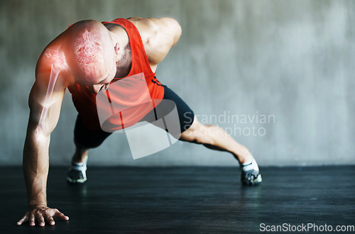 Image of Fitness, push up and bodybuilder man in strong, power training or exercise in gym and muscle x ray overlay. Health, sports and athlete person with shoulder or arm workout on ground on wall background