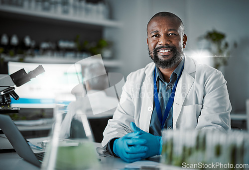 Image of Scientist black man, portrait and lab with smile for research, plants and vision with innovation with senior woman. African science expert, happy and motivation at desk with pride, goals and mission