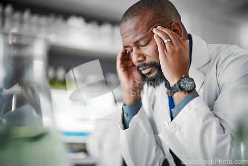 Image of Headache, stress and black man with burnout from science, lab work and research innovation. Sad, frustrated and African scientist with migraine pain, anxiety and tired from healthcare analysis