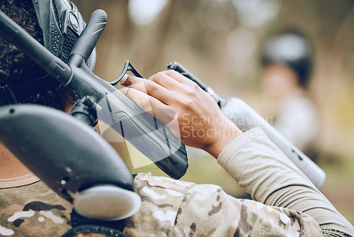 Image of Man in paintball game, gun in hand and sports, fitness and battlefield challenge, war and soldier outdoor. Extreme sport, exercise with shooting range and military mission and training in camouflage