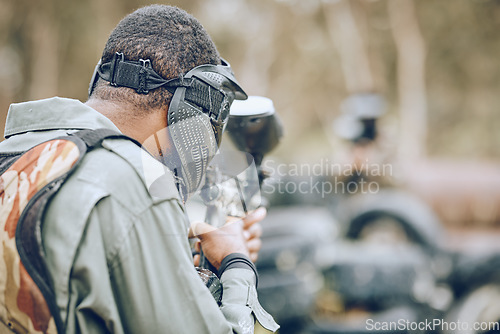 Image of Paintball, man and game, gun and target, sport with fitness and battlefield challenge, war soldier outdoor. Mockup space, extreme sports and exercise, shooting range and military mission and training