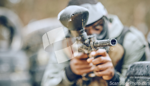 Image of Paintball gun zoom, target and sports outdoor with black man and fitness, battlefield challenge and war with soldier. Mockup space, extreme sport and exercise, shooting range and military mission