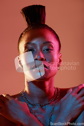 Image of Portrait, face and makeup with a model black woman in studio on a neon background for beauty. Art, kaleidoscope and style with an attractive young female posing indoor for culture or cosmetics