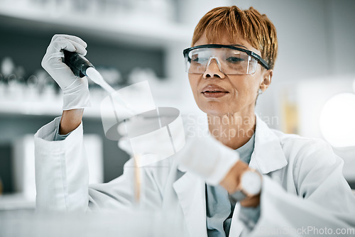 Image of Test tube, science and black woman scientist in laboratory research, analysis and chemistry vision, safety and focus. Liquid exam of chemical, solution or medical study professional, person or expert