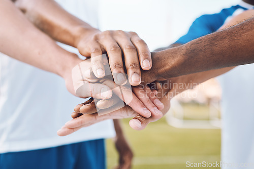 Image of Teamwork, sports and stack of hands for soccer for support, motivation and community on field. Collaboration, team building and group of players ready for game success, training and match celebration